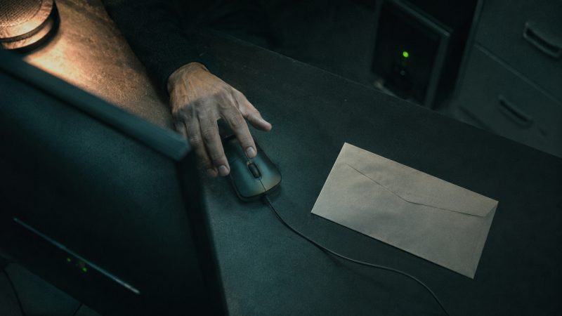 Tax preparer pausing before a suspicious email cinematic visual | Verito